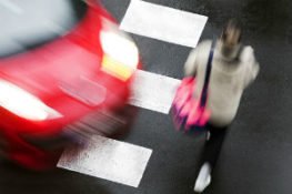 pedestrian getting struck by car in an accident at crosswalk