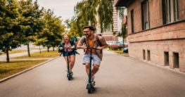 a man and a woman enjoying scooter ride